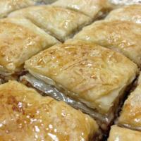 Lusy's Baklava · Delicate filo pastry layered with butter, finely chopped walnuts, sugar and rosewater infusi...