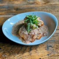 Biscuits & Gravy · two house made biscuits, pork gravy, scallions
