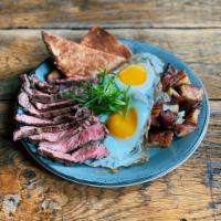 Steak and Eggs · 6oz steak, two fried eggs, choice of potatoes, wheat toast, butter, scallions