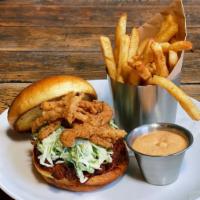 BBQ Pulled Pork Sandwich · adobo seasoned bbq pulled pork, creamy cabbage scallion slaw, crispy onion strings, brioche ...