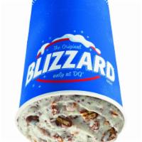 Nestle® Drumstick with Peanuts Blizzard® Treat · Choco covered Drumstick cone pieces and chopped peanuts blended with our world-famous vanill...