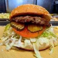 1/4 lb. Burger · Grilled patty on a toasted bun with 1000 Island Dressing, Onions, Lettuce, Tomatoes, and Pic...