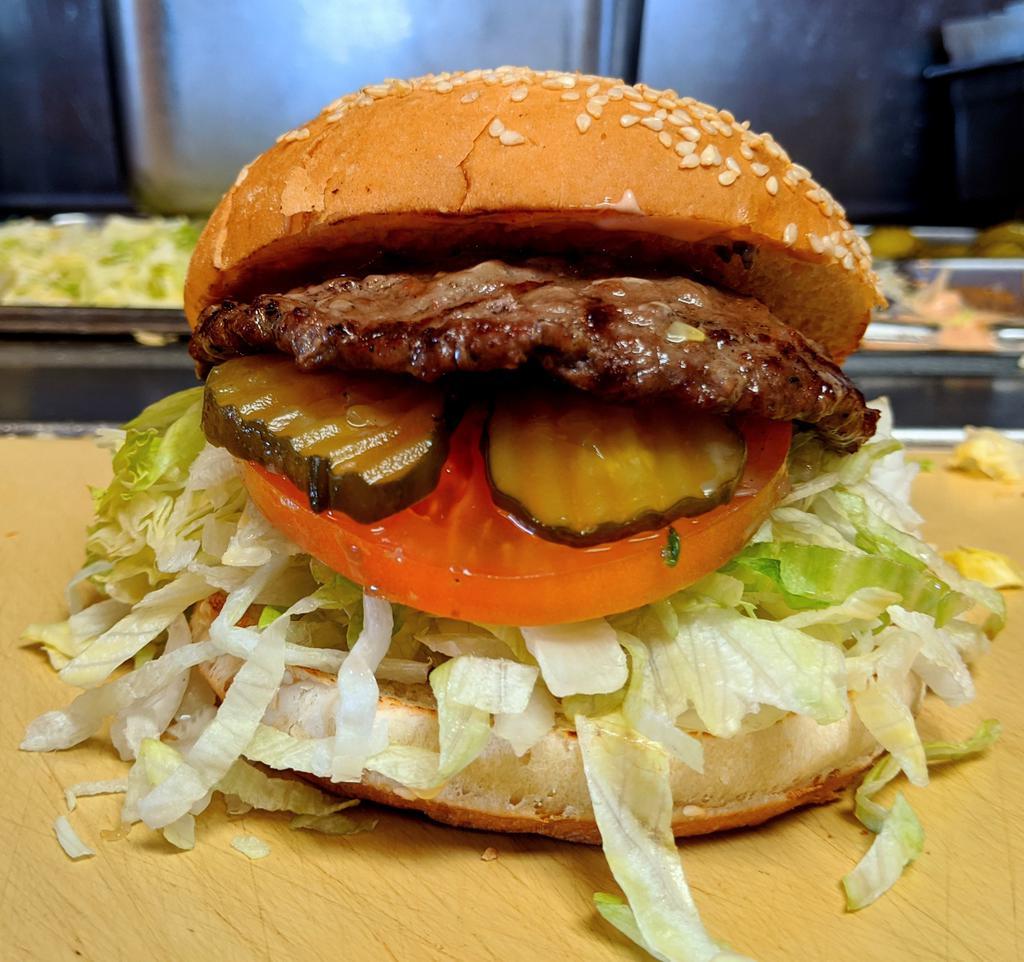 1/4 lb. Burger · Grilled patty on a toasted bun with 1000 Island Dressing, Onions, Lettuce, Tomatoes, and Pickles