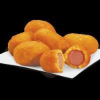 Mini Corn Dogs · Mini chicken franks wrapped in sweet honey corn batter and fried to perfection.