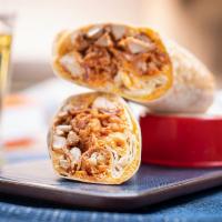 The Country Boy Burrito - Fried Chicken · flour tortilla rolled up + stuffed with fried chicken, mozzarella cheese, tots, corn, brown ...