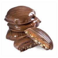 6 oz. Chocolate Jag Paws · Enjoy 6 oz. of bite sized pecan caramels enrobed in peterbrooke’s creamy milk chocolate. The...