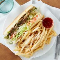 Philly Steak Sandwich  · steak with grilled onion, green paper and mushroom, mayo, lettuce, tomato and swiss cheese 