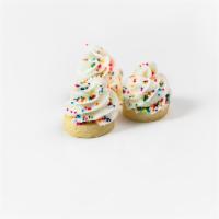 Buttercream Bites · A small sugar cookie topped with buttercream icing and sprinkles on top. A quick treat!