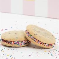 Chocolate Chip Buttercream Sandwich with Sprinkles · 2 chocolate chip cookies sandwiched with buttercream in the middle and rolled in rainbow spr...