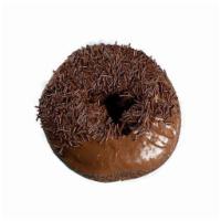 Triple Chocolate Threat Donut · Chocolate cake donut dipped in chocolate glaze and chocolate sprinkles