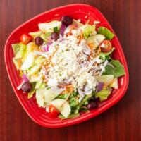Greek Salad · Lettuce, tomato, cucumber, carrots, feta, Kalamata olives, beets and red onions.