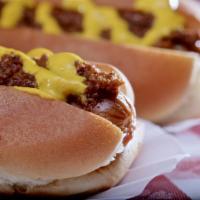 Chili Dog · Sausage served on a bun and topped with chili.  Mustard, ketchup, chili. Add slaw for an add...