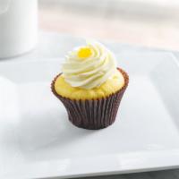 Lemon Cupcake · Vanilla cake filled with tangy lemon topped with our lemon buttercream and a dollop of tangy...