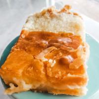 Ooey Gooey Butter Bar · Butter cookie crust topped with creamy butter filling. 