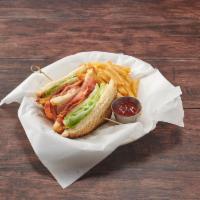 The BLT Grilled Sandwich · Bacon, lettuce and tomato with mayo. Served with french fries and pickle. 
