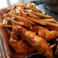 Chicken Strips · Tender chicken breast battered and fried to a golden brown. Served with pub chips and your c...