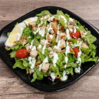 Chicken Caesar Salad · Grilled chicken breast, garden fresh romaine lettuce, shredded parmesan cheese, and croutons.