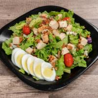 Classic Cobb Salad · Ranch. Grilled chicken with bacon, hardboiled egg, and blue cheese crumbles on fresh salad g...
