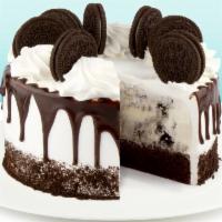 Cookies and Cream · Cookies and Cream Ice Cream and rich chocolate cake drizzled in chocolate ganache and crowne...