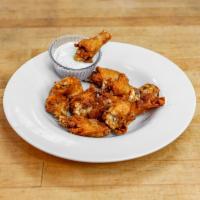 Chicken Wings · 9 pieces. , side of creamy.