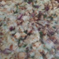 BBQ Chicken Pizza · Fresh cilantro, grilled chicken breast, red onion, BBQ sauce and extra cheese.