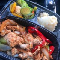 Filetillo de pollo · Sauteed Grilled Chicken Strips with onions, red peppers, and green peppers