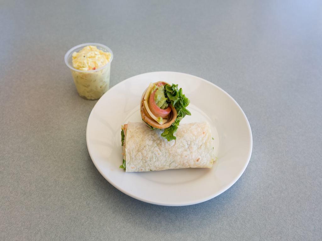 Turkey, Swiss and Guacamole Sandwich · In a low fat, low calorie wrap with lettuce and tomato.