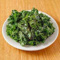 Vegan Garlic Kale Salad · Raw kale, washed and blended with our house-made vegan garlic aoli, and tossed with dried cr...