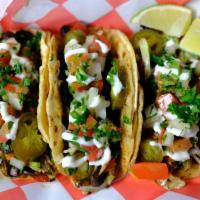 Very Veggie Street Tacos [GF] · Three a la carte tacos stuffed with mushrooms, onions, peppers, cabbage, and jalapenos toppe...