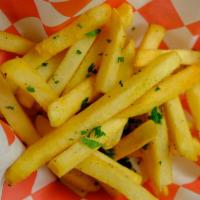 Side Fries · Crispy fries tossed in our trashy seasoning with salt n peppers.