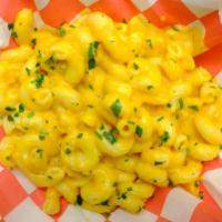 Side Mac n Cheez · A large portion of cavatappi pasta folded into our creamy house-made cheez sauce.