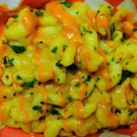 Side Buffalo Mac · A large portion of cavatappi pasta folded into our creamy house-made cheez sauce and drizzle...