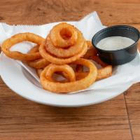 Beer Battered Onion Rings · Spicy or black and tan onion rings served with homemade ranch dressing.