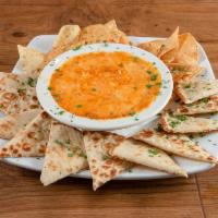 Quesadillas · Melted cheddar cheese on our tortilla served with pico de gallo, olives, cilantro, sour crea...