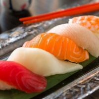 S4. Nigiri Combo · 8 pieces of nigiri sushi, chefs assortment.