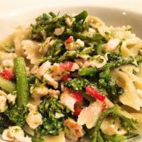 Pasta Piazza · Farfalle, broccoli, grilled chicken & roasted peppers in garlic & olive oil.