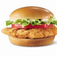 Dude® Chicken Fried Steak Sandwich · A crispy chicken fillet topped with crisp chopped lettuce, thick-cut tomato and mayo on a wa...