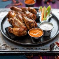 8 Pcs  All Natural Wings · All natural (no hormones or antibiotics)  chicken wings cooked to perfection. Choose your fa...