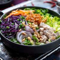 Chinese Chicken Salad · grilled chicken, red onion, wontons, peanuts, peas, red cabbage, carrots, sesame seeds, hois...
