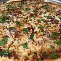 BBQ Pizza · BBQ sauce, chicken breast, red onion, mozzarella and fresh cilantro.