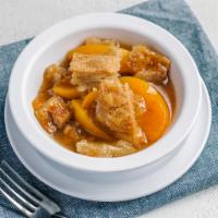 Peach Cobbler by Chicago's Home of Chicken and Waffles · By Chicago's Home of Chicken and Waffles. Sweet, sliced peaches baked in a cinnamon butter s...