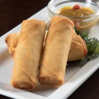SPRING ROLLS · Lightly fried vegetable spring rolls served with spicy sesame mustard dipping sauce