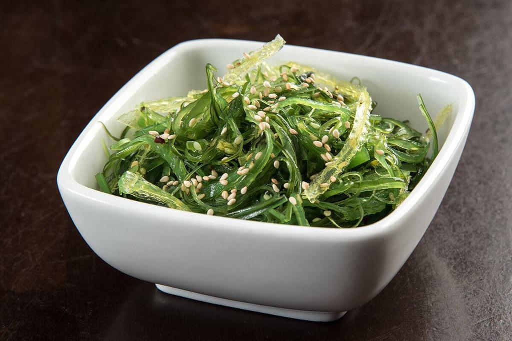 SEAWEED SALAD · Traditional seaweed salad; seaweed with vinegar, soy sauce, sesame oil, ginger and garlic, topped with sesame seeds