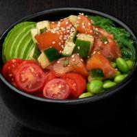 SPICY SALMON BOWL*  · Salmon, cucumber and green onions mixed with poke sauce; served with grape tomatoes and avoc...