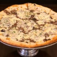 Mixed Mushroom Pizza · Cremini, shirake, portobello and white mushrooms, mozzarella cheese, and no pizza sauce.