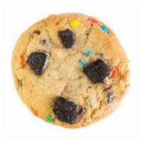 Conflicted Cookie · Our signature cookie dough mixed with M&M's, Oreo's and milk chocolate chips.