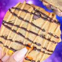 Nutter Butter Lover  · Signature brown sugar cookie dough mixed with crushed Reese's PB cups, Reese's pieces candy,...