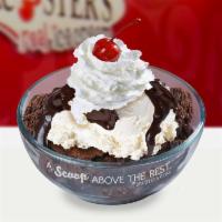 Hot Fudge Brownie Sundae · Brownie with 2 scoops of vanilla ice cream topped with hot fudge, whip cream, and cherry on ...