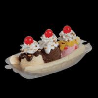 Banana Split · Three of your favorite ice cream flavors, two banana slices, your choice of wet topping, all...