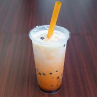 Thai Milk Tea · Freshly brewed Thai tea Iced Milk tea, comes with Black Regular black Boba.